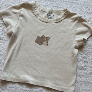 Juniors cream crop tee with baby/bear on front